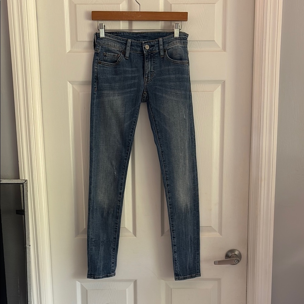 Blue Skinny Jeans with Tapered Leg and Faded Wash